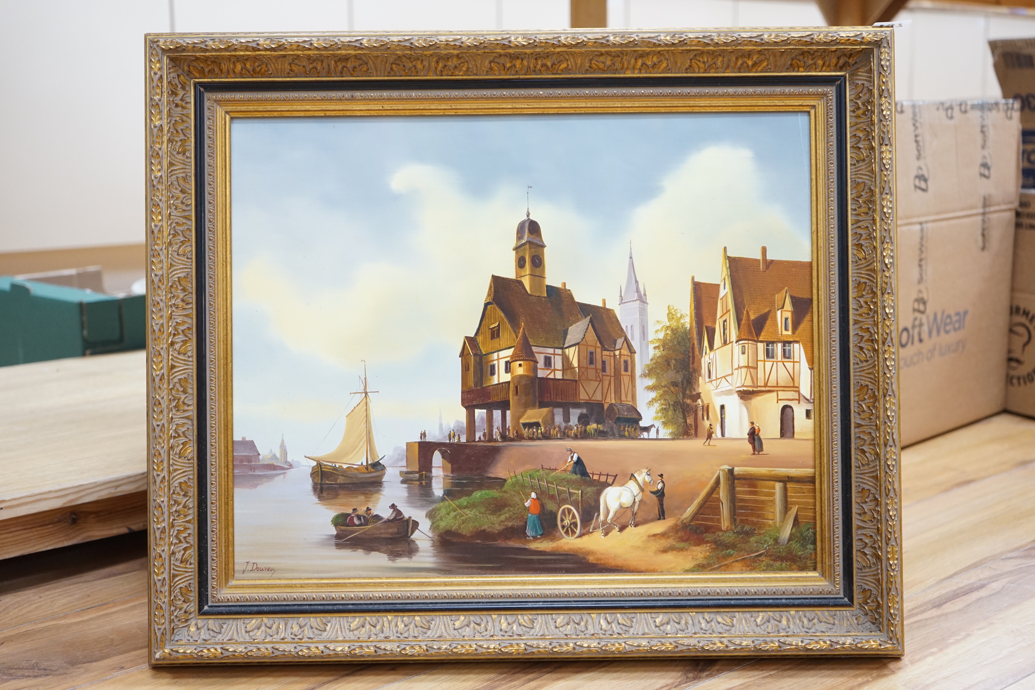 Jacques Douven (1908-2002) oil on board, Town scene with river and boats, signed, 38 x 48cm, ornate gilt framed